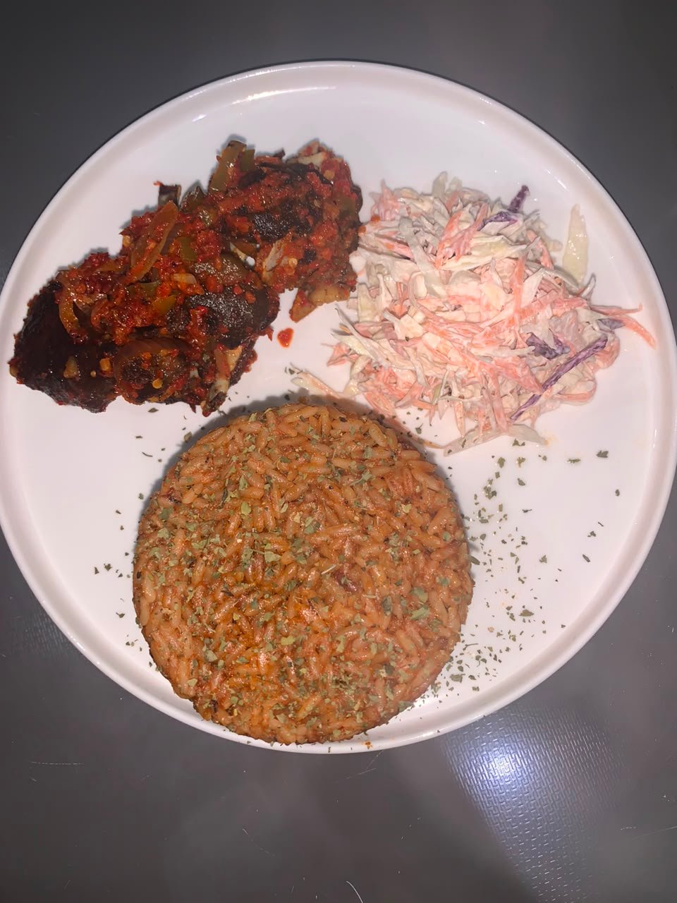 Jollof rice and peppered goat meat